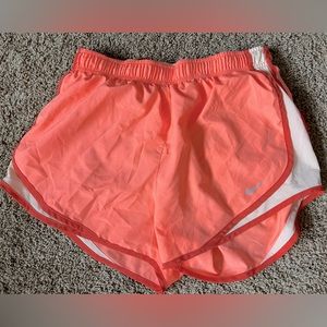 Four pairs of Nike athletic shorts, size Medium